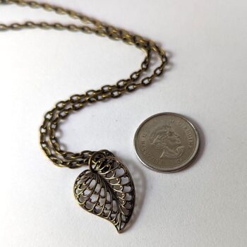 Antique Bronze Hollow Leaf Vintage Style Necklace - Image 2