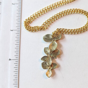 Gold Triple Cascading Fixed Orchid Flower Necklace - Image 2