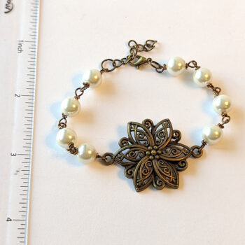 Antique Bronze Flower White Beads Bracelet - Image 2