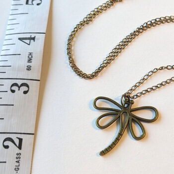 Hollow Antique Bronze Dragonfly With Curved Tail Necklace - Image 3