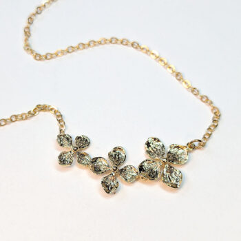 KC Gold Cascading Triple Four Leaf Petal Flower Necklace